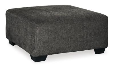 Celebrate strength and durability in design with the Ballinasloe oversized accent ottoman. Neutral color opens doors for you to use your imagination with accessorizing the room. Softly textured chenille cushion sports stylish versatility. Throw up your feet or use it as a table for a show-stopping tray. It’s all up to you.Corner-blocked frame | High-resiliency foam cushion wrapped in thick poly fiber | Polyester upholstery | Exposed feet with faux wood finish