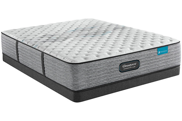 Loo for a better night’s sleep? Look no further than the new Beautyrest® Harmony Lux mattress. An innovative support system with unique coil design, paired with advanced comfort technologies combine to unlock your best sleep. The Harmony Lux incorporates a carbon fiber foam layer for consistent support, a layer of gel memory foam directly below the quilted sleep surface for immediate pressure relief and finally a premium memory foam layer featuring actual diamond particles to help conduct heat away from the body. Beautyrest is partnering with Seaqual™ to offer unique sustainable fabric technologies within each Beautyrest Harmony Lux mattress. Seaqual is the leader in ocean plastic recovery and upcycling efforts and together this partnership will help promote cleaner oceans with every mattress sold.Comfort level: extra firm | Profile: 13.5" | Precision Support System™ powered by T2 Pocketed Coil Technology delivers extra support where your body needs it most | RightTemp™ Wave Foam features ultra-strong, highly conductive carbon fibers | InfiniCool™ Lux provides a cool sleep environment, including a cool-to-the-touch sleep surface | Sustainable fabric featuring Seaqual™ technology helps promote cleaner oceans | Proudly assembled in the U.S.A. | 10-year limited warranty | State recycling fee may apply | Note: Purchasing mattress and foundation from two different brands voids warranty
