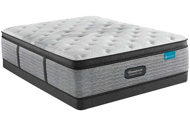 Looking for a better night’s sleep? Look no further than the new Beautyrest® Harmony Lux mattress. An innovative support system with unique coil design, paired with advanced comfort technologies combine to unlock your best sleep. The Harmony Lux incorporates a carbon fiber foam layer for consistent support, a layer of gel memory foam directly below the quilted sleep surface for immediate pressure relief and finally a premium memory foam layer featuring actual diamond particles to help conduct heat away from the body. Beautyrest is partnering with Seaqual™ to offer unique sustainable fabric technologies within each Beautyrest Harmony Lux mattress. Seaqual is the leader in ocean plastic recovery and upcycling efforts and together this partnership will help promote cleaner oceans with every mattress sold.Comfort level: medium | Profile: 15.75" | Pillowtop construction | Precision Support System™ powered by T2 Pocketed Coil Technology delivers extra support where your body needs it most | RightTemp™ Wave Foam features ultra-strong, highly conductive carbon fibers | InfiniCool™ Lux provides a cool sleep environment, including a cool-to-the-touch sleep surface | Sustainable fabric featuring Seaqual™ technology helps promote cleaner oceans | Proudly assembled in the U.S.A. | 10-year limited warranty | State recycling fee may apply