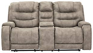 Discover just how much better faux leather can be in the richly styled Yacolt power reclining loveseat. Outfitted with our latest and greatest padded faux leather with an authentic weathered effect, this ultra-comfortable reclining loveseat with power is the embodiment of everyday luxury. Sporting a 43" high-back design, built-out headrest for added support and extended ottoman, it truly has you covered from head to toe. An Easy View™ power adjustable headrest lets you fully recline and still have a primo view of the TV. Plus, you can chill out while you recharge thanks to a USB charging port in the one-touch power control. And how about a storage console with hidden cup holders and built-in wood-tone tabletop? We’ll drink to that.Dual-sided recliner | One-touch power control with Easy View™ power adjustable headrest and USB plug-in | Corner-blocked frame with metal reinforced seat | Attached cushions | 43" high back | Storage console with 2 hidden stainless steel cup holders and built-in wood-tone tabletop | Cup holders removable for easy cleaning | High-resiliency foam cushions wrapped in thick poly fiber | Polyester/polyurethane (faux leather) upholstery | Extended ottoman for enhanced comfort | Power cord included; UL Listed | Estimated Assembly Time: 15 Minutes