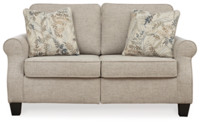 Whether your home is adorned with contemporary or American classic furnishings, the Allesio loveseat has a timeless sense of elegance that’s sure to fit right in. Signature elements include roll arms and cutaway side profiling for added flair. Ultra neutral and plush to the touch, the sesame-hued fabric is a brilliant reflection of your good taste. Rounded cornering gives the box cushions a softened, tailored aesthetic.Corner-blocked frame | Loose seat and reversible back cushions | High-resiliency foam cushions wrapped in thick poly fiber | Polyester upholstery | 2 throw pillows included | Pillows with soft polyfill | Exposed feet with faux wood finish | Assembly required | Platform foundation system resists sagging 3x better than spring system after 20,000 testing cycles by providing more even support | Smooth platform foundation maintains tight, wrinkle-free look without dips or sags that can occur over time with sinuous spring foundations | Estimated Assembly Time: 15 Minutes