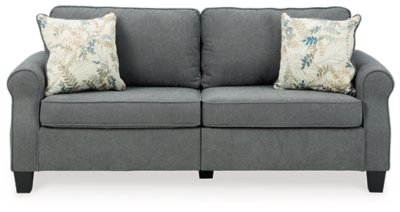 Whether your home is adorned with contemporary or American classic furnishings, the Alessio sofa has a timeless sense of elegance that's sure to fit right in. Signature elements include roll arms and cutaway side profiling for added flair. Richly neutral and soft to the touch, the charcoal blue fabric is a brilliant reflection of your good taste that's right on trend. Rounded cornering gives the box cushions a softened, tailored aesthetic that makes this sofa a great transitional piece of furniture.Corner-blocked frame | Loose seat and reversible back cushions | High-resiliency foam cushions | Polyester upholstery | Throw pillows included | Pillows with soft polyfill | Exposed feet with faux wood finish | Assembly required | Estimated Assembly Time: 15 Minutes