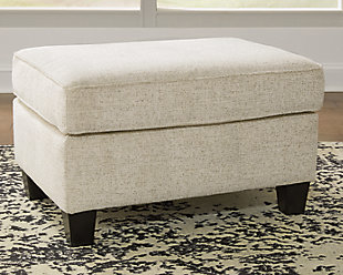 If you’re looking to lighten the mood, you’re sure to find the Abinger ottoman a breath of fresh air. Covered in a cream-tone chenille upholstery loaded with plush texture, this less-is-more contemporary ottoman is one sensational sidekick.Corner-blocked frame | Firmly cushioned | High-resiliency foam cushion wrapped in thick poly fiber | Polyester upholstery | Exposed feet with faux wood finish