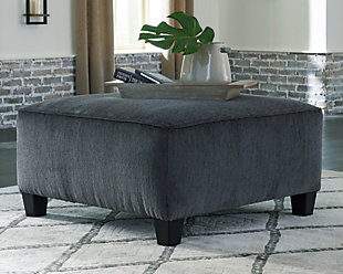 If you’re looking for a smokin’ hot look priced to entice, you’re sure to find the Abinger oversized ottoman beautifully fits the bill. Covered in a smoke gray chenille upholstery loaded with plush texture, this less-is-more contemporary ottoman is one sensational sidekick.Corner-blocked frame | Firmly cushioned | High-resiliency foam cushion wrapped in thick poly fiber | Polyester upholstery | Exposed tapered feet