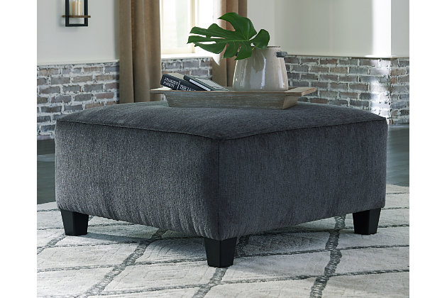 If you’re looking for a smokin’ hot look priced to entice, you’re sure to find the Abinger oversized ottoman beautifully fits the bill. Covered in a smoke gray chenille upholstery loaded with plush texture, this less-is-more contemporary ottoman is one sensational sidekick.Corner-blocked frame | Firmly cushioned | High-resiliency foam cushion wrapped in thick poly fiber | Polyester upholstery | Exposed tapered feet