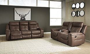 Rustic character comes forth in the Jesolo warm brown reclining sofa and loveseat set. Designer stitching adds a fashion-forward touch to the soft cushions. Faux suede fabric speaks to your knack for superior-quality materials. High back provides ample support as you get off your feet for a bit. With just one pull of tab, you’ll be easing back into relaxation. Infinite levels of comfort await.Includes sofa and loveseat | Corner-blocked frame with metal reinforced seat | Attached back and seat cushions | Pull tab reclining motion | Dual-sided recliners; sofa’s middle seat remains stationary | Loveseat with lift-top storage console and 2 cup holders | High-resiliency foam cushions wrapped in thick poly fiber | Polyester/polyurethane upholstery | Estimated Assembly Time: 30 Minutes
