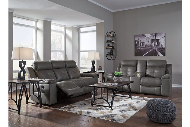 Rustic character comes forth in the dark gray Jesolo reclining sofa. Designer stitching adds a fashion-forward touch to the soft cushions. Faux suede fabric speaks to your knack for superior-quality materials. High back provides ample support as you get off your feet for a bit. With just one pull of tab, you’ll be easing back into relaxation. Infinite levels of comfort await.Corner-blocked frame with metal reinforced seat | Attached back and seat cushions | Pull tab reclining motion | Dual-sided recliner, middle seat remains stationary | High-resiliency foam cushions wrapped in thick poly fiber | Polyester/polyurethane upholstery | Estimated Assembly Time: 15 Minutes
