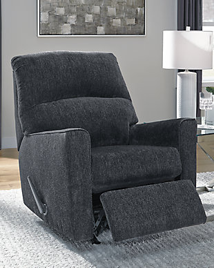 If style is the question, then the Altari rocker recliner is the answer. Clean-lined profile is beautiy contemporary. Plush chenille fabric and plump cushioning make it so easy to comfortably kick up your heels. Richly neutral hue complements a variety of decor.Gentle roc motion | Attached cushions | High-resiliency foam cushions wrapped in thick poly fiber | Corner-blocked frame with metal reinforced seat | One-pull reclining motion | Polyester upholstery