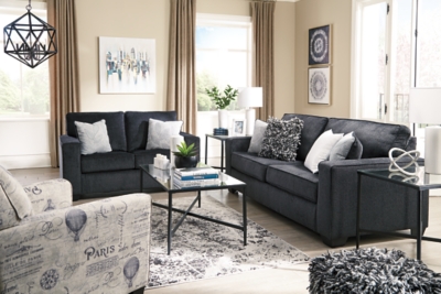 If style is the question, then the Altari sofa sleeper is the answer. Sporting clean lines and sleek track arms, the decidedly contemporary profile is enhanced with plump cushioning and a chenille-feel upholstery, so pleasing to the touch. Sure to play well with so many color schemes, this sofa sleeper in slate gray includes a pair of understated floral pattern pillows for fashionably fresh appeal. Pull-out queen mattress in quality memory foam comfortably accommodates overnight guests.Corner-blocked frame | Attached back and loose seat cushions | High-resiliency foam cushions wrapped in thick poly fiber | 2 decorative pillows included | Pillows with soft polyfill | Polyester upholstery and pillows | Exposed feet with faux wood finish | Included bi-fold queen memory foam mattress sits atop a supportive steel frame | Memory foam provides better airflow for a cooler night’s sleep | Memory foam encased in damask ticking