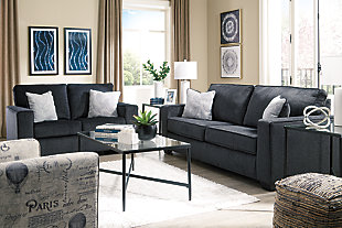 If style is the question, then the Altari loveseat is the answer. Sporting clean lines and sleek track arms, the decidedly contemporary profile is enhanced with plump cushioning and a chenille-feel upholstery, so pleasing to the touch. Sure to play well with so many color schemes, this loveseat in slate gray includes a pair of understated floral pattern pillows for fashionably fresh appeal.Corner-blocked frame | Attached back and loose seat cushions | High-resiliency foam cushions wrapped in thick poly fiber | 2 decorative pillows included | Pillows with soft polyfill | Polyester upholstery and pillows | Exposed feet with faux wood finish | Platform foundation system resists sagging 3x better than spring system after 20,000 testing cycles by providing more even support | Smooth platform foundation maintains tight, wrinkle-free look without dips or sags that can occur over time with sinuous spring foundations
