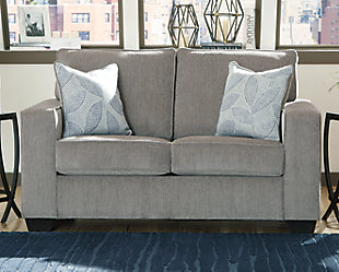 If style is the question, then the Altari loveseat is the answer. Sporting clean lines and sleek track arms, the decidedly contemporary profile is enhanced with plump cushioning and a chenille-feel upholstery that's so pleasing to the touch. Sure to play well with so many color schemes, this loveseat in richly neutral alloy includes a pair of understated floral pattern pillows for fashionably fresh appeal.Corner-blocked frame | Attached back and loose seat cushions | High-resiliency foam cushions wrapped in thick poly fiber | 2 decorative pillows included | Pillows with soft polyfill | Polyester upholstery and pillows | Exposed feet with faux wood finish | Platform foundation system resists sagging 3x better than spring system after 20,000 testing cycles by providing more even support | Smooth platform foundation maintains tight, wrinkle-free look without dips or sags that can occur over time with sinuous spring foundations