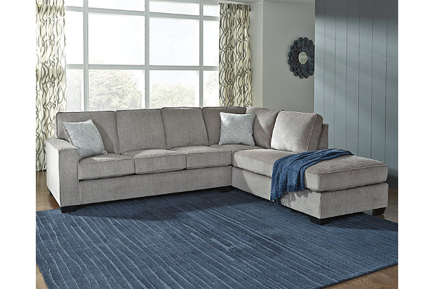 If style is the question, then the Altari sectional is the answer. Sporting clean lines and sleek track arms, the decidedly contemporary profile is enhanced with plump cushioning and a chenille-feel upholstery, so pleasing to the touch. Sure to play well with so many color schemes, this sectional in richly neutral alloy includes a pair of understated floral pattern pillows for fashionably fresh appeal.Includes 2 pieces: right-arm facing corner chaise and left-arm facing sofa | "Left-arm and "right-arm" describe the position of the arm when you face the piece | Corner-blocked frame | Attached back and loose seat cushions | High-resiliency foam cushions wrapped in thick poly fiber | 2 decorative pillows included | Pillows with soft polyfill | Polyester upholstery and pillows | Exposed feet with faux wood finish | Platform foundation system resists sagging 3x better than spring system after 20,000 testing cycles by providing more even support | Smooth platform foundation maintains tight, wrinkle-free look without dips or sags that can occur over time with sinuous spring foundations | Estimated Assembly Time: 5 Minutes