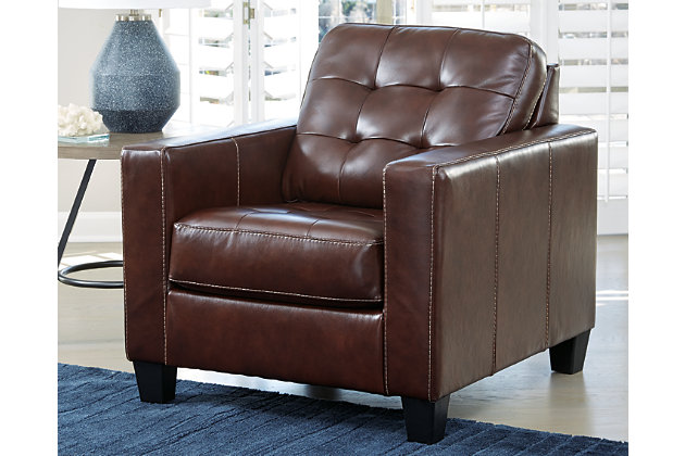 Tailor your space with the tidy structure of the Altonbury chair. Decorative stitching and button tufting on the box cushion make for a very neat appearance. With real leather covering the seating area—where it matters most—this piece has skillfully matched leather elsewhere, so you won’t get hemmed in by the price.Corner-blocked frame | Attached back and loose seat cushions | High-resiliency foam cushions wrapped in thick poly fiber | Leather interior upholstery; vinyl/polyester exterior upholstery | Exposed feet with faux wood finish | Platform foundation system resists sagging 3x better than spring system after 20,000 testing cycles by providing more even support | Smooth platform foundation maintains tight, wrinkle-free look without dips or sags that can occur over time with sinuous spring foundations