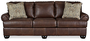 What could be better than the feel of real leather? It’s yours for the taking—at a comfortably affordable price—with the Beamerton sofa sleeper. Rest assured, the seating area and armrests are covered in genuine leather for an incomparable experience. Plush roll arms and distinctive details such as box-stitched cushions and prominent bun feet reflect a sense of richly rustic charm that never goes out of style. Memory foam queen mattress comfortably accommodates overnight guests.Corner-blocked frame | Attached back and loose seat cushions | High-resiliency foam cushions wrapped in thick poly fiber | Leather interior upholstery; vinyl/polyester exterior upholstery | 2 throw pillows included | Pillows with soft polyfill | Exposed feet with faux wood finish | Included bi-fold queen memory foam mattress sits atop a supportive steel frame | Memory foam provides better airflow for a cooler night’s sleep | Memory foam encased in damask ticking