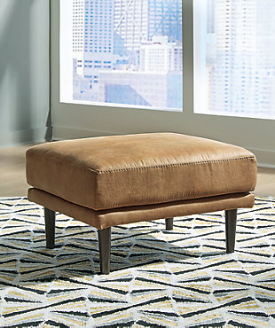 For a fresh spot in your space, turn to the Arroyo ottoman. This invigorating piece breathes warmth into your home with its striking caramel faux leather upholstery and tapered legs. Wind down at the end of a long day with your feet propped up on this canyon of comfort.Corner-blocked frame | Firmly cushioned | High-resiliency foam cushion wrapped in thick poly fiber | Metal base | Polyester and polyurethane (faux leather) upholstery | Exposed legs with faux wood finish | Minor assembly (simply attach legs) | Estimated Assembly Time: 15 Minutes