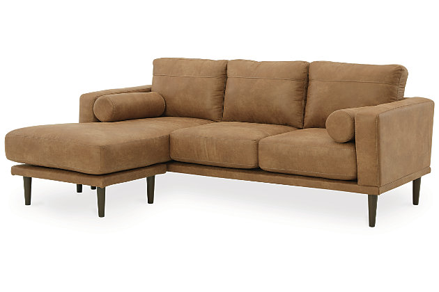 For a fresh spot in your space, turn to the Arroyo sofa chaise. This invigorating piece breathes warmth into your home with its striking caramel faux leather upholstery, modern bolster pillows and tapered legs. Wind down at the end of a long day and sink into this canyon of comfort.Corner-blocked frame | High-resiliency foam cushions wrapped in thick poly fiber | Loose cushions; reversible chaise cushion | Metal seat base | Polyester and polyurethane (faux leather) upholstery | Bolster pillows included | Pillows with soft polyfill | Exposed legs with faux wood finish | Minor assembly (simply attach legs) | Estimated Assembly Time: 15 Minutes