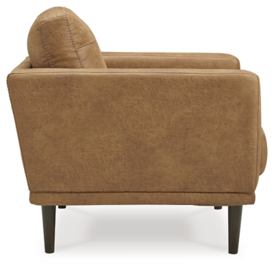 For a fresh spot in your space, turn to the Arroyo arm chair. This invigorating piece breathes warmth into your home with its striking caramel faux leather upholstery and tapered legs. Wind down at the end of a long day when you sink into this canyon of comfort.Corner-blocked frame | High-resiliency foam cushions wrapped in thick poly fiber | Non-reversible loose seat and back cushions | Metal seat base | Polyester and polyurethane (faux leather) upholstery | Exposed legs with faux wood finish | Minor assembly (simply attach legs) | Estimated Assembly Time: 15 Minutes