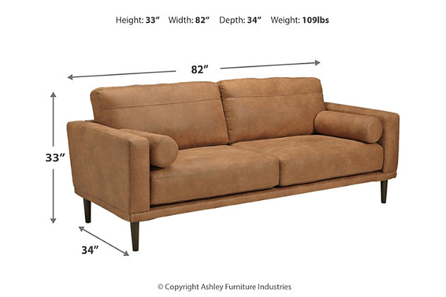 For a fresh spot in your space, turn to the Arroyo sofa. This invigorating piece breathes warmth into your home with its striking caramel faux leather upholstery, modern bolster pillows and tapered legs. Wind down at the end of a long day when you sink into this canyon of comfort.Corner-blocked frame | High-resiliency foam cushions wrapped in thick poly fiber | Non-reversible loose seat and back cushions | Metal seat base | Polyester and polyurethane (faux leather) upholstery | 2 bolster pillows | Exposed legs with faux wood finish | Minor assembly (simply attach legs) | Estimated Assembly Time: 15 Minutes