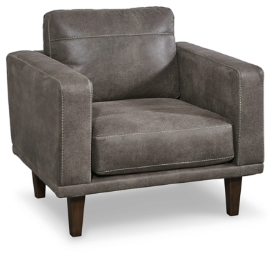 For a fresh spot in your space, turn to the Arroyo designer arm chair. This invigorating piece breathes warmth into your home with its striking gray faux leather upholstery and tapered legs. Wind down at the end of a long day when you sink into this canyon of comfort.Corner-blocked frame | High-resiliency foam cushions wrapped in thick poly fiber | Non-reversible loose seat and back cushions | Metal seat base | Polyester/polyurethane upholstery | Exposed legs with faux wood finish | Minor assembly (simply attach legs) | Estimated Assembly Time: 15 Minutes