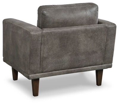 For a fresh spot in your space, turn to the Arroyo designer arm chair. This invigorating piece breathes warmth into your home with its striking gray faux leather upholstery and tapered legs. Wind down at the end of a long day when you sink into this canyon of comfort.Corner-blocked frame | High-resiliency foam cushions wrapped in thick poly fiber | Non-reversible loose seat and back cushions | Metal seat base | Polyester/polyurethane upholstery | Exposed legs with faux wood finish | Minor assembly (simply attach legs) | Estimated Assembly Time: 15 Minutes