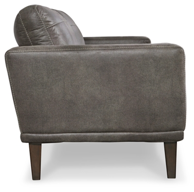 For a fresh spot in your space, turn to the Arroyo designer loveseat. This invigorating piece breathes warmth into your home with its striking gray faux leather upholstery and tapered legs. Wind down at the end of a long day when you sink into this canyon of comfort.Corner-blocked frame | High-resiliency foam cushions wrapped in thick poly fiber | Non-reversible loose seat and back cushions | Metal seat base | Polyester/polyurethane upholstery | 2 bolster pillows | Exposed legs with faux wood finish | Minor assembly (simply attach legs) | Estimated Assembly Time: 15 Minutes