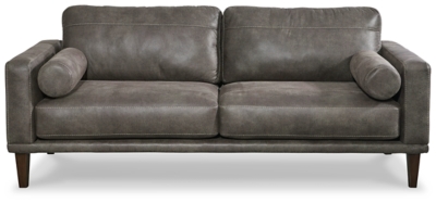 For a fresh spot in your space, turn to the Arroyo designer sofa. This invigorating piece breathes warmth into your home with its striking gray faux leather upholstery, modern bolster pillows and tapered legs. Wind down at the end of a long day when you sink into this canyon of comfort.Corner-blocked frame | High-resiliency foam cushions wrapped in thick poly fiber | Non-reversible loose seat and back cushions | Metal seat base | Polyester/polyurethane upholstery | 2 bolster pillows | Exposed legs with faux wood finish | Minor assembly (simply attach legs) | Estimated Assembly Time: 15 Minutes