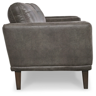 For a fresh spot in your space, turn to the Arroyo designer sofa. This invigorating piece breathes warmth into your home with its striking gray faux leather upholstery, modern bolster pillows and tapered legs. Wind down at the end of a long day when you sink into this canyon of comfort.Corner-blocked frame | High-resiliency foam cushions wrapped in thick poly fiber | Non-reversible loose seat and back cushions | Metal seat base | Polyester/polyurethane upholstery | 2 bolster pillows | Exposed legs with faux wood finish | Minor assembly (simply attach legs) | Estimated Assembly Time: 15 Minutes