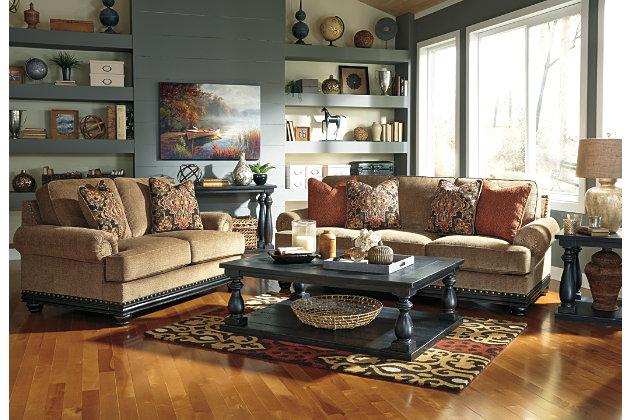 The generously scaled Mallacar coffee table in black has a dramatic presence—exactly what an eclectically styled room needs. Solid wood planks and thick veneer merge seamlessly together for a hearty helping of style. Handsomely turned legs connect to a lower shelf flush with the floor. A rustic wirebrush technique gives this stunning rectangular coffee table in black with show-through contrasting just enough of a weathered sensibility.Coffee table made of veneers, wood and engineered wood | Rich black finish with show-through effect | Lower shelf provides essential display and storage space | Made of veneers, wood and engineered wood | Saw cut planking | Rustic wirebrush details give the table a weathered aesthetic | Assembly required | Estimated Assembly Time: 15 Minutes