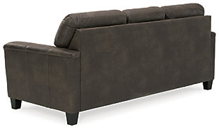 If you love the cool look of leather but long for the warm feel of fabric, you can take comfort in the Navi queen sofa sleeper. Wrapped in a fabulous faux leather with a weathered hue and hint of pebbly texture to resemble the real deal, this decidedly modern sofa proves less is more. Elements include angled side profiling and track armrests wrapped with a layer of pillowy softness for that little something extra. Prominent jumbo stitching and clean-lined divided back styling lend fashion-forward flair. Rest assured, the queen memory foam mattress comfortably accommodates overnight guests.Corner-blocked frame | Attached back and loose seat cushions | High-resiliency foam cushions wrapped in thick poly fiber | Polyester and polyurethane (faux leather) upholstery | Exposed feet with faux wood finish | Included bi-fold queen memory foam mattress sits atop a supportive steel frame | Memory foam provides better airflow for a cooler night’s sleep | Memory foam encased in damask ticking