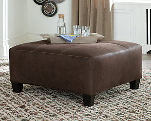 If you love the cool look of leather but long for the warm feel of fabric, you can take comfort in the Navi oversized ottoman. Wrapped in a fabulous faux leather with a weathered hue and hint of pebbly texture to resemble the real deal, this decidedly modern ottoman proves less is more. Elements include jumbo stitching for fashion-forward flair.Corner-blocked frame | High-resiliency foam cushion wrapped in thick poly fiber | Polyester and polyurethane (faux leather) upholstery | Firmly cushioned | Exposed feet with faux wood finish
