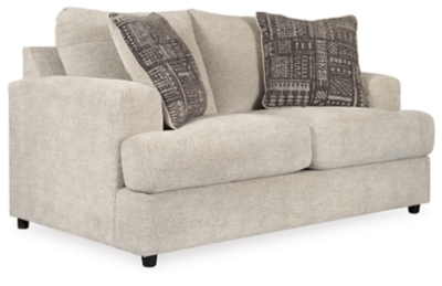 Flaunting a trendsetting silhouette, the Soletren loveseat puts the contemporary in your contemporary home. Its “three over two” profile eliminates the center seat cushion, giving you elongated plushness and deep seating. Chunky chenille fabric satisfies your need for a piece that feels as good as it looks. Accented with soft jacquard chenille throw pillows for a splash of geometric pattern and color contrast.Corner-blocked frame | Attached back and loose seat cushions | High-resiliency foam cushions wrapped in thick poly fiber | Platform foundation system resists sagging 3x better than spring system after 20,000 testing cycles by providing more even support | Smooth platform foundation maintains tight, wrinkle-free look without dips or sags that can occur over time with sinuous spring foundations | 2 decorative pillows included | Pillows with soft polyfill | Polyester upholstery and polyester pillows | Exposed feet with faux wood finish