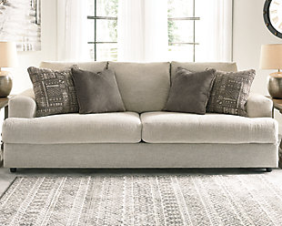 Flaunting a trendsetting silhouette, the Soletren sofa puts the contemporary in your contemporary home. Its “three over two” profile eliminates the center seat cushion, giving you elongated plushness and deep seating. Chunky chenille fabric satisfies your need for a piece that feels as good as it looks. Accented with soft jacquard chenille throw pillows for a splash of geometric pattern and color contrast.Corner-blocked frame | Attached back and loose seat cushions | High-resiliency foam cushions wrapped in thick poly fiber | Platform foundation system resists sagging 3x better than spring system after 20,000 testing cycles by providing more even support | Smooth platform foundation maintains tight, wrinkle-free look without dips or sags that can occur over time with sinuous spring foundations | 4 decorative pillows included | Pillows with soft polyfill | Polyester upholstery and polyester pillows | Exposed feet with faux wood finish