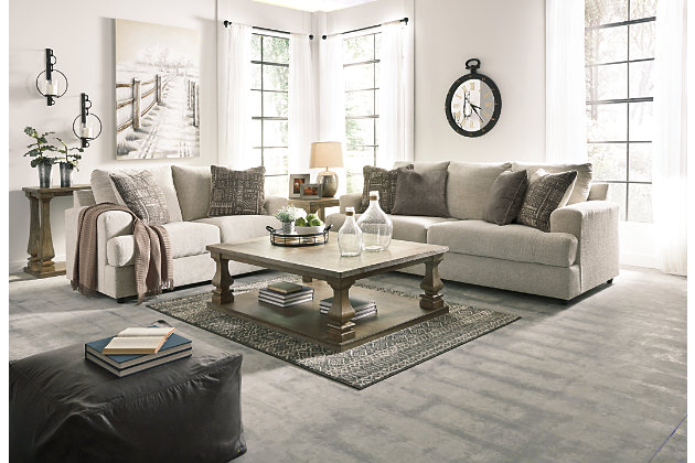 Flaunting a trendsetting silhouette, the Soletren sofa puts the contemporary in your contemporary home. Its “three over two” profile eliminates the center seat cushion, giving you elongated plushness and deep seating. Chunky chenille fabric satisfies your need for a piece that feels as good as it looks. Accented with soft jacquard chenille throw pillows for a splash of geometric pattern and color contrast.Corner-blocked frame | Attached back and loose seat cushions | High-resiliency foam cushions wrapped in thick poly fiber | Platform foundation system resists sagging 3x better than spring system after 20,000 testing cycles by providing more even support | Smooth platform foundation maintains tight, wrinkle-free look without dips or sags that can occur over time with sinuous spring foundations | 4 decorative pillows included | Pillows with soft polyfill | Polyester upholstery and polyester pillows | Exposed feet with faux wood finish