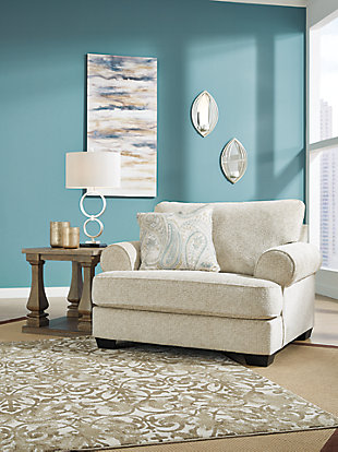 The Monaghan oversized chair strikes a beautiful balance between classic and current. Traditional elements include t-cushion seating and setback roll arms, angled for modern flair. Jacquard paisley pillow makes a muted, mellow complement to the chair’s casual textured chenille upholstery. Choice of sandstone beige is a light and lovely style awakening.Plush seating | Corner-blocked frame | Reversible cushions | High-resiliency foam cushions wrapped in thick poly fiber | Platform foundation system resists sagging 3x better than spring system after 20,000 testing cycles by providing more even support | Smooth platform foundation maintains tight, wrinkle-free look without dips or sags that can occur over time with sinuous spring foundations | Toss pillow included | Pillow with soft polyfill | Polyester upholstery; polyester and polyester/linen pillow | Exposed feet with faux wood finish