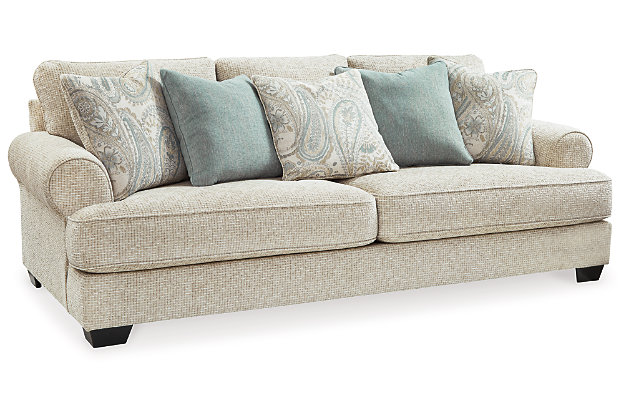 The Monaghan sofa and loveseat strike a beautiful balance between classic and current. Traditional elements include t-cushion seating and setback roll arms, angled for modern flair. Posh collection of pillows in spa mist and jacquard paisley make a muted, mellow complement to the sofa’s casual textured chenille upholstery. Choice of sandstone beige is a light and lovely style awakening.Includes sofa and loveseat | Plush seating | Corner-blocked frame | Reversible cushions | High-resiliency foam cushions wrapped in thick poly fiber | Toss pillows included | Pillows with soft polyfill | Polyester upholstery; polyester and polyester/linen pillows | Exposed feet with faux wood finish | Sofa and loveseat with platform foundation system resists sagging 3x better than spring system after 20,000 testing cycles by providing more even support | Smooth platform foundation maintains tight, wrinkle-free look without dips or sags that can occur over time with sinuous spring foundations