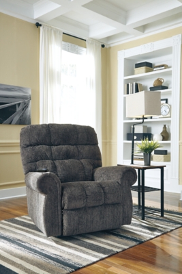 The next generation of recliners has arrived in fine style. Beyond its perfectly placed pillow support and sumptuous chenille-feel upholstery, Ernestine power lift recliner with dual motor design takes custom comfort to a new level. With the touch of a button, power lift feature gently eases you from the ultimate slumber into a lift-and-tilt position to get you back on your feet, effortlessly.One-touch (hand control) power button with adjustable positions | Corner-blocked frame with metal reinforced seat | Attached back and seat cushions | High-resiliency foam cushions wrapped in thick poly fiber | Polyester upholstery | Dual motors control the footrest and back independently for custom comfort positioning | Emergency battery backup runs on two 9-volt batteries (not included), in case of power outage | Power cord included; UL Listed | Excluded from promotional discounts and coupons | Estimated Assembly Time: 15 Minutes