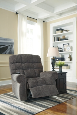 The next generation of recliners has arrived in fine style. Beyond its perfectly placed pillow support and sumptuous chenille-feel upholstery, Ernestine power lift recliner with dual motor design takes custom comfort to a new level. With the touch of a button, power lift feature gently eases you from the ultimate slumber into a lift-and-tilt position to get you back on your feet, effortlessly.One-touch (hand control) power button with adjustable positions | Corner-blocked frame with metal reinforced seat | Attached back and seat cushions | High-resiliency foam cushions wrapped in thick poly fiber | Polyester upholstery | Dual motors control the footrest and back independently for custom comfort positioning | Emergency battery backup runs on two 9-volt batteries (not included), in case of power outage | Power cord included; UL Listed | Excluded from promotional discounts and coupons | Estimated Assembly Time: 15 Minutes