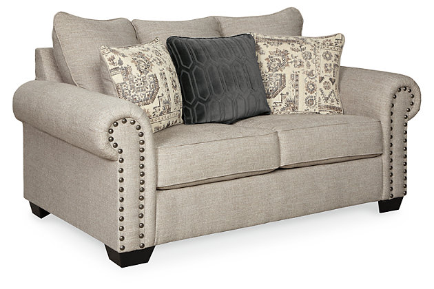 The Zarina sofa and loveseat let you make a high-style statement at a comfortably affordable price. Richly traditional roll arms are given a modern punch care of oversized nailhead trim in a black nickeltone finish. Linen-weave upholstery in fresh and clean sandstone beige is complemented designer pillows that add texture and sophistication.Includes sofa and loveseat | Corner-blocked frame | Attached back and loose seat cushions | Toss pillows included | Pillows with soft polyfill | Polyester upholstery; polyester and polyester/chenille pillows | Black nickeltone nailhead trim | Exposed feet with faux wood finish | High-resiliency foam cushions wrapped in thick poly fiber | Sofa and loveseat with platform foundation system resists sagging 3x better than spring system after 20,000 testing cycles by providing more even support | Smooth platform foundation maintains tight, wrinkle-free look without dips or sags that can occur over time with sinuous spring foundations