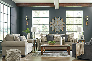 The Zarina sofa lets you make a high-style statement at a comfortably affordable price. Richly traditional roll arms are given a modern punch care of oversized nailhead trim in a black nickel-tone finish. Linen-weave upholstery in fresh and clean sandstone beige is complemented with designer pillows that add texture and sophistication.Corner-blocked frame | Attached back and loose seat cushions | High-resiliency foam cushions wrapped in thick poly fiber | Platform foundation system resists sagging 3x better than spring system after 20,000 testing cycles by providing more even support | Smooth platform foundation maintains tight, wrinkle-free look without dips or sags that can occur over time with sinuous spring foundations | 5 toss pillows included | Pillows with soft polyfill | Polyester upholstery; polyester and polyester/chenille pillows | Black nickel-tone nailhead trim | Exposed feet with faux wood finish