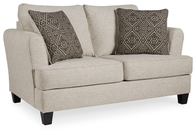 Whether you’re creating a warm and cozy modern farmhouse or cool and contemporary escape, the Alcona loveseat is sure to look right at home. High armrests with a rounded track design provide a chic, sheltering effect. Light linen-tone upholstery is a beauty to behold.Corner-blocked frame | Attached back and reversible seat cushions | High-resiliency foam cushions wrapped in thick poly fiber | Platform foundation system resists sagging 3x better than spring system after 20,000 testing cycles by providing more even support | Smooth platform foundation maintains tight, wrinkle-free look without dips or sags that can occur over time with sinuous spring foundations | 2 toss pillows included | Pillows with soft polyfill | Polyester upholstery and pillows | Exposed feet with faux wood finish