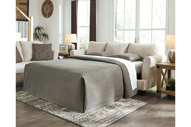 Whether you’re creating a warm and cozy modern farmhouse or cool and contemporary escape, the Alcona sofa sleeper is sure to look right at home. High armrests with a rounded track design provide a chic, sheltering effect. Light linen-tone upholstery and 3-over-2 cushion styling is a beauty to behold. Pull-out queen mattress in quality memory foam comfortably accommodates overnight guests.Corner-blocked frame | Attached back and reversible seat cushions | High-resiliency foam cushions wrapped in thick poly fiber | 5 toss pillows included | Pillows with soft polyfill | Polyester upholstery; polyester, polyester/linen, polyester/rayon pillows | Exposed feet with faux wood finish | Included bi-fold queen memory foam mattress sits atop a supportive steel frame | Memory foam provides better airflow for a cooler night’s sleep | Memory foam encased in damask ticking