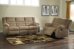The Tulen reclining sofa and loveseat set puts the win in winning. Its waterfall back design and doubly plump pillow top arms team up with soft chenille fabric to go for the goal. Ample seating room makes the comfort possibilities endless. Sit back and relax. You won’t go wrong with this reclining set.Includes sofa and loveseat | Dual-sided recliners; sofa’s middle seat remains stationary | Pull tab reclining motion | Corner-blocked frame with metal reinforced seat | High-resiliency foam cushion wrapped in thick poly fiber | Polyester upholstery