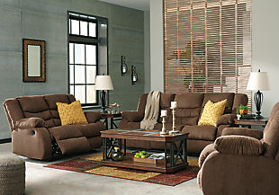 The Tulen reclining sofa puts the win in winning. Its waterfall back design and doubly plump pillow top arms team up with soft chenille fabric to go for the goal. Ample seating room makes the comfort possibilities endless. Sit back and relax. You won’t go wrong with this reclining loveseat.Dual-sided recliner; middle seat remains stationary | Pull tab reclining motion | Corner-blocked frame with metal reinforced seat | High-resiliency foam cushion wrapped in thick poly fiber | Polyester upholstery