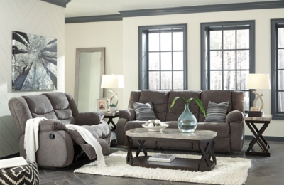 The Tulen reclining sofa puts the win in winning. Its waterfall back design and doubly plump pillow top arms team up with soft chenille fabric to go for the goal. Ample seating room makes the comfort possibilities endless. Sit back and relax. You won’t go wrong with this reclining loveseat.Dual-sided recliner; middle seat remains stationary | Pull tab reclining motion | Corner-blocked frame with metal reinforced seat | High-resiliency foam cushion wrapped in thick poly fiber | Polyester upholstery