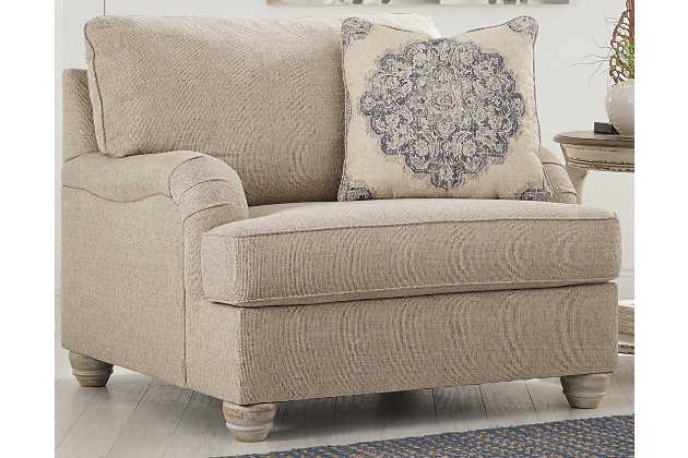 Charming with Charles of London arms that beautifully go with the flow, the Dandrea oversized chair in bisque beige is richly elegant yet comfortably made for everyday living. Showcasing distressed at its best, the chair’s turned bun feet with patina finish are aged to perfection. Designer toss pillow makes the most of moody blues.Corner-blocked frame | Attached back and reversible seat cushions | High-resiliency foam cushions wrapped in thick poly fiber | Platform foundation system resists sagging 3x better than spring system after 20,000 testing cycles by providing more even support | Smooth platform foundation maintains tight, wrinkle-free look without dips or sags that can occur over time with sinuous spring foundations | Toss pillow included | Pillow with soft polyfill | Polyester upholstery and pillow | Exposed feet with faux wood finish