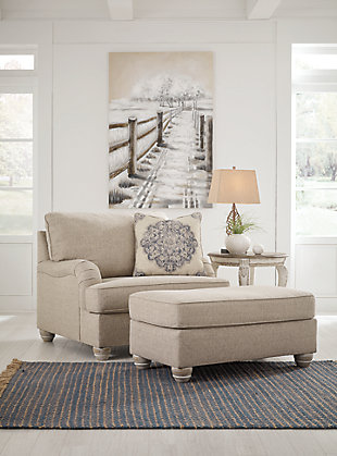 Charming with Charles of London arms that beautifully go with the flow, the Dandrea oversized chair in bisque beige is richly elegant yet comfortably made for everyday living. Showcasing distressed at its best, the chair’s turned bun feet with patina finish are aged to perfection. Designer toss pillow makes the most of moody blues.Corner-blocked frame | Attached back and reversible seat cushions | High-resiliency foam cushions wrapped in thick poly fiber | Platform foundation system resists sagging 3x better than spring system after 20,000 testing cycles by providing more even support | Smooth platform foundation maintains tight, wrinkle-free look without dips or sags that can occur over time with sinuous spring foundations | Toss pillow included | Pillow with soft polyfill | Polyester upholstery and pillow | Exposed feet with faux wood finish