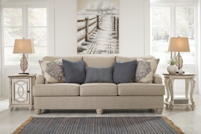 Charming with Charles of London arms that beautifully go with the flow, the Dandrea sofa sleeper in bisque beige is richly elegant yet comfortably made for everyday living. Showcasing distressed at its best, the sofa’s turned bun feet with patina finish are aged to perfection. Five designer toss pillows make the most of moody blues.Corner-blocked frame | Attached back and reversible seat cushions | High-resiliency foam cushions wrapped in thick poly fiber | 5 toss pillows included | Pillows with soft polyfill | Polyester upholstery; polyester, polyester/polyurethane and polyester/cotton pillows | Exposed feet with faux wood finish | Included bi-fold queen memory foam mattress sits atop a supportive steel frame | Memory foam provides better airflow for a cooler night’s sleep | Memory foam encased in damask ticking