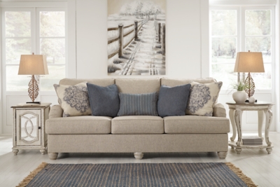 Charming with Charles of London arms that beautifully go with the flow, the Dandrea sofa sleeper in bisque beige is richly elegant yet comfortably made for everyday living. Showcasing distressed at its best, the sofa’s turned bun feet with patina finish are aged to perfection. Five designer toss pillows make the most of moody blues.Corner-blocked frame | Attached back and reversible seat cushions | High-resiliency foam cushions wrapped in thick poly fiber | 5 toss pillows included | Pillows with soft polyfill | Polyester upholstery; polyester, polyester/polyurethane and polyester/cotton pillows | Exposed feet with faux wood finish | Included bi-fold queen memory foam mattress sits atop a supportive steel frame | Memory foam provides better airflow for a cooler night’s sleep | Memory foam encased in damask ticking