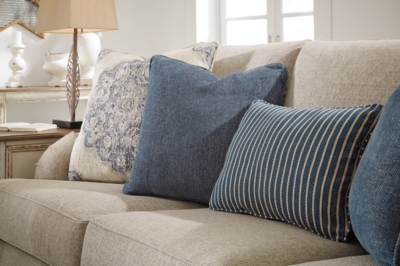 Charming with Charles of London arms that beautifully go with the flow, the Dandrea sofa sleeper in bisque beige is richly elegant yet comfortably made for everyday living. Showcasing distressed at its best, the sofa’s turned bun feet with patina finish are aged to perfection. Five designer toss pillows make the most of moody blues.Corner-blocked frame | Attached back and reversible seat cushions | High-resiliency foam cushions wrapped in thick poly fiber | 5 toss pillows included | Pillows with soft polyfill | Polyester upholstery; polyester, polyester/polyurethane and polyester/cotton pillows | Exposed feet with faux wood finish | Included bi-fold queen memory foam mattress sits atop a supportive steel frame | Memory foam provides better airflow for a cooler night’s sleep | Memory foam encased in damask ticking