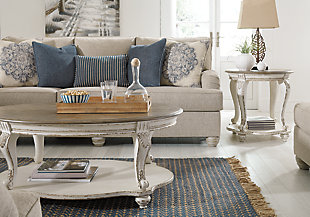 Charming with Charles of London arms that beautifully go with the flow, the Dandrea sofa in bisque beige is richly elegant yet comfortably made for everyday living. Showcasing distressed at its best, the sofa’s turned bun feet with patina finish are aged to perfection. Five designer toss pillows make the most of moody blues.Corner-blocked frame | Attached back and reversible seat cushions | High-resiliency foam cushions wrapped in thick poly fiber | Platform foundation system resists sagging 3x better than spring system after 20,000 testing cycles by providing more even support | Smooth platform foundation maintains tight, wrinkle-free look without dips or sags that can occur over time with sinuous spring foundations | 5 toss pillows included | Pillows with soft polyfill | Polyester upholstery; polyester, polyester/polyurethane and polyester/cotton pillows | Exposed feet with faux wood finish